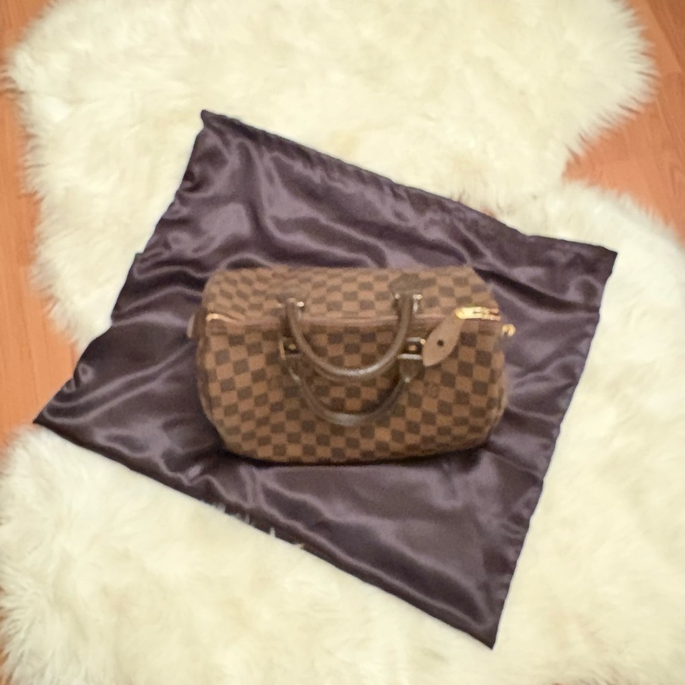 Black silky dust bag drawstrings